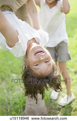 Girl Hanging Upside Down View Large Photo Image Stock Photograph - Girl Hanging Upside Down. Fotosearch