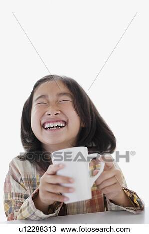 Girl With Mug Laughing View Large Photo Image Stock Image - Girl With Mug Laughing. Fotosearch