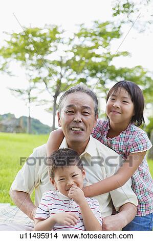 Grandfather With Two Grandchildren View Large Photo Image Picture - Grandfather With Two Grandchildren. Fotosearch