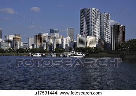 Picture - Hamarikyu Gardens and skyline, Minato Ward, Tokyo Prefecture, Honshu, Japan. Fotosearch