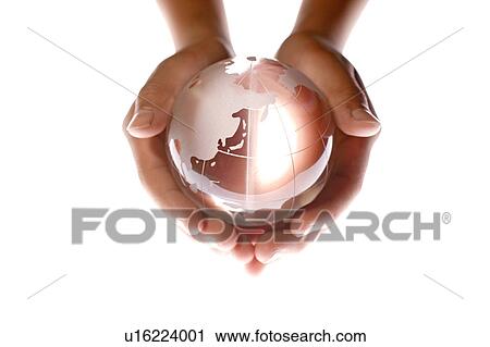 Hands holding globe View Large Photo Image Stock Image - Hands holding globe. Fotosearch