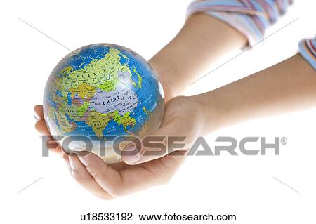 Hands holding globe View Large Photo Image Stock Image - Hands holding globe. Fotosearch