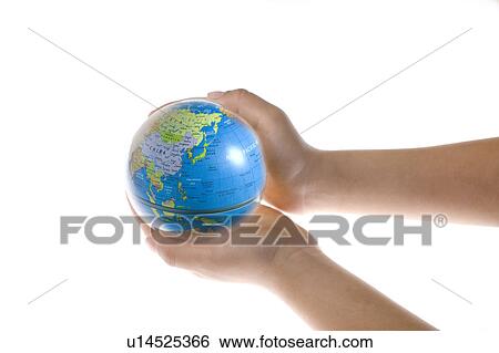 Stock Photograph - Hands holding globe. Fotosearch