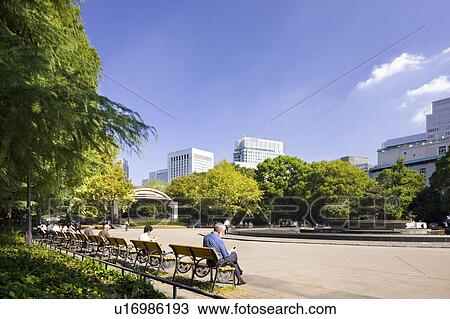 Hibiya park and skyline of Marunouchi, Chiyoda Ward, Tokyo Prefecture, Honshu, Japan View Large Photo Image Stock Image - Hibiya park and skyline of Marunouchi, Chiyoda Ward, Tokyo Prefecture, Honshu, Japan. Fotosearch