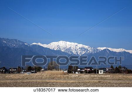 Hida mountains and rice field, Nagano Prefecture, Honshu, Japan View Large Photo Image Stock Photo - Hida mountains and rice field, Nagano Prefecture, Honshu, Japan. Fotosearch