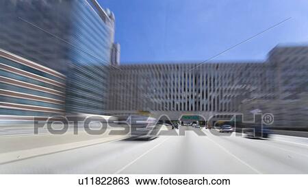 Highway going under a building, Chicago, Illinois, USA View Large Photo Image Stock Image - Highway going under a building, Chicago, Illinois, USA. Fotosearch