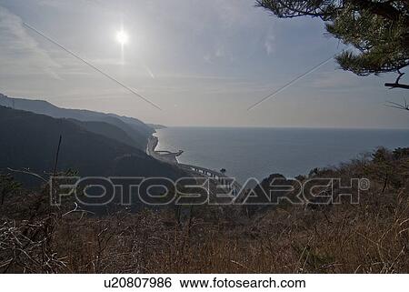 Stock Photograph - Hokuriku National Expressway by Coast. Fotosearch
