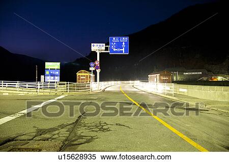 Stock Photography - Japan National Route 158 at night, Nagawado Dam, Nagano Prefecture, Honshu, Japan. Fotosearch