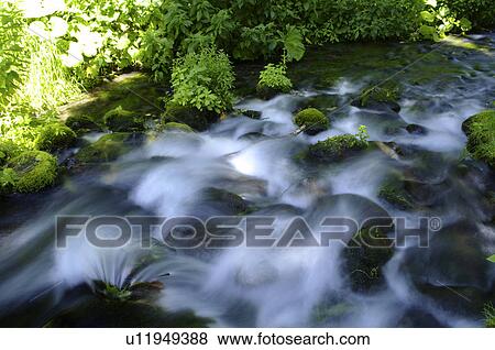 Stock Photo - Kaminoko Pond, long exposure, Kiyosato town, Hokkaido prefecture, Japan. Fotosearch