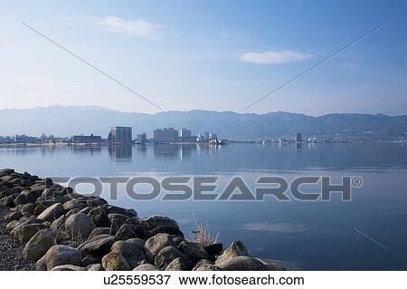 Lake Suwa and Cityscape of Suwa city, Nagano Prefecture, Honshu, Japan View Large Photo Image Stock Photo - Lake Suwa and Cityscape of Suwa city, Nagano Prefecture, Honshu, Japan. Fotosearch