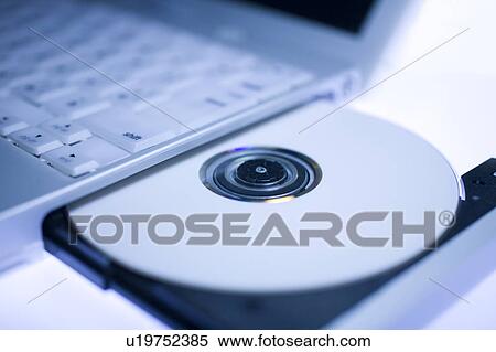 Laptop and CD View Large Photo Image Stock Photography - Laptop and CD. Fotosearch