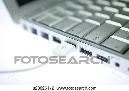 Stock Image - Laptop and USB connection. Fotosearch