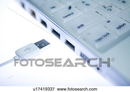 Stock Photo - Laptop and USB connection. Fotosearch