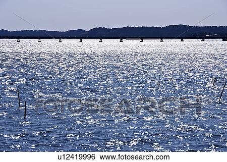 Stock Photograph - Light Reflecting in Water. Fotosearch