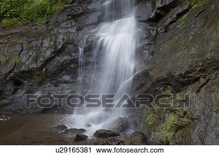 Stock Image - Maboroshi-no-otaki waterfall, Niigata Prefecture, Honshu, Japan. Fotosearch