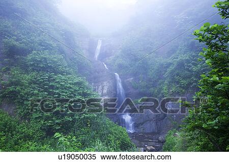 Stock Photography - Maboroshi-no-otaki waterfall, Niigata Prefecture, Honshu, Japan. Fotosearch