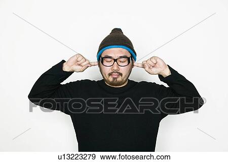 Man With Fingers in His Ears View Large Photo Image Stock Photo - Man With Fingers in His Ears. Fotosearch