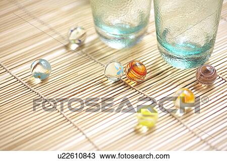 Stock Image - Marbles and glasses, close up, Kanagawa prefecture, Japan. Fotosearch