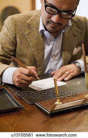 Mature Man Signing on Paper View Large Photo Image Stock Image - Mature Man Signing on Paper. Fotosearch