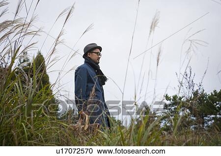 Mature Man Walking in Field View Large Photo Image Stock Image - Mature Man Walking in Field. Fotosearch