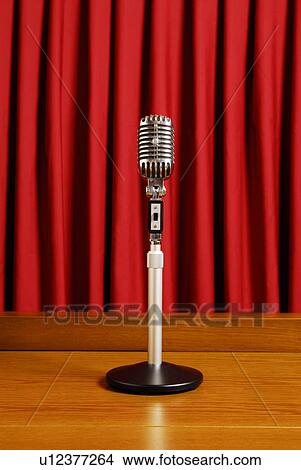 Picture - Microphone on stand at stage. Fotosearch