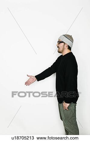Mid Adult Man About to Shake Hands View Large Photo Image Stock Image - Mid Adult Man About to Shake Hands. Fotosearch
