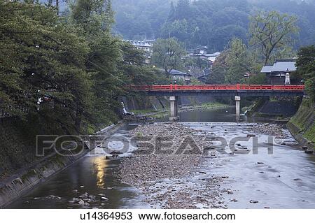 Stock Image - Miyagawa river and Nakahashi bridge, Takayama city, Gifu Prefecture, Honshu, Japan. Fotosearch