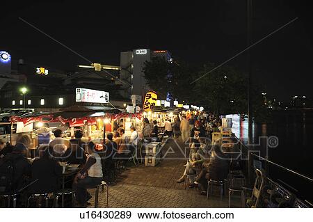 Stock Photo - Night-time food market at Fukuoka city, Fukuoka Prefecture, Kyushu, Japan. Fotosearch
