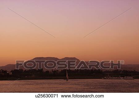 Nile river at dusk, Egypt View Large Photo Image Stock Image - Nile river at dusk, Egypt. Fotosearch