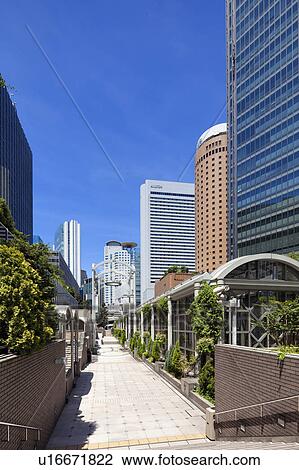 Stock Image - Office building in Umeda, Osaka City, Osaka Prefecture, Honshu, Japan. Fotosearch
