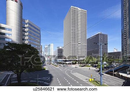Stock Image - Office building in Umeda, Osaka City, Osaka Prefecture, Honshu, Japan. Fotosearch