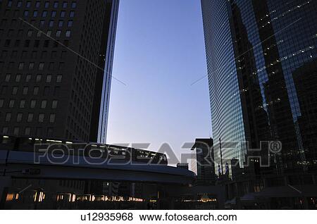 Stock Photo - Office buildings at dusk, Shiodome, Minato Ward, Tokyo Prefecture, Honshu, Japan. Fotosearch