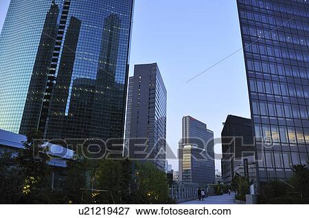 Stock Photo - Office buildings at dusk, Shiodome, Minato Ward, Tokyo Prefecture, Honshu, Japan. Fotosearch