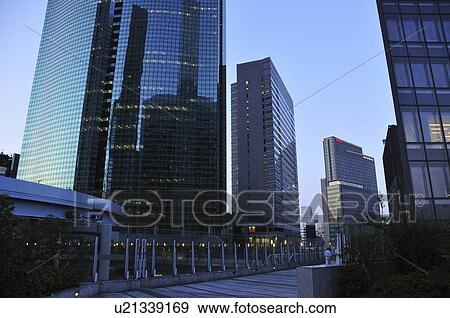 Stock Photo - Office buildings at dusk, Shiodome, Minato Ward, Tokyo Prefecture, Honshu, Japan. Fotosearch