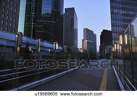 Office buildings at dusk, Shiodome, Minato Ward, Tokyo Prefecture, Honshu, Japan View Large Photo Image Stock Photography - Office buildings at dusk, Shiodome, Minato Ward, Tokyo Prefecture, Honshu, Japan. Fotosearch