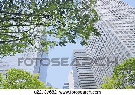 Stock Image - Office buildings in Shinjuku Ward, Tokyo Prefecture, Honshu, Japan. Fotosearch