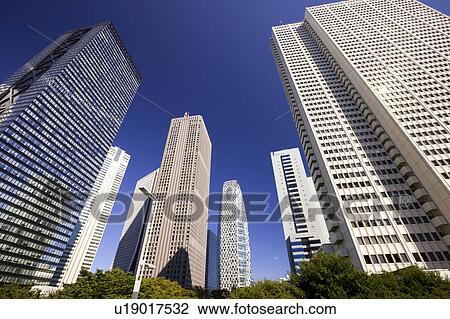 Office buildings, low angle view, Shinjuku Ward, Tokyo Prefecture, Honshu, Japan View Large Photo Image Stock Image - Office buildings, low angle view, Shinjuku Ward, Tokyo Prefecture, Honshu, Japan. Fotosearch