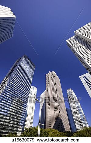 Office buildings, low angle view, Shinjuku Ward, Tokyo Prefecture, Honshu, Japan View Large Photo Image Stock Photo - Office buildings, low angle view, Shinjuku Ward, Tokyo Prefecture, Honshu, Japan. Fotosearch