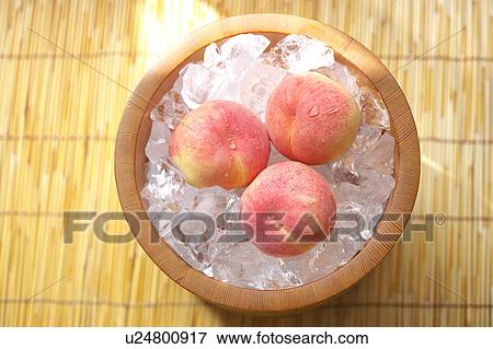 Peaches in a bucket of ice cubes, Kanagawa Prefecture, Honshu, Japan View Large Photo Image Stock Photo - Peaches in a bucket of ice cubes, Kanagawa Prefecture, Honshu, Japan. Fotosearch