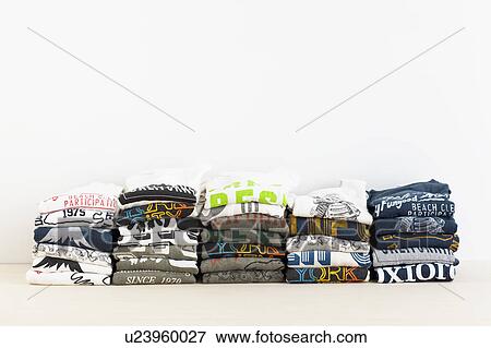 Stock Photo - Pile of Folded Shirts. Fotosearch