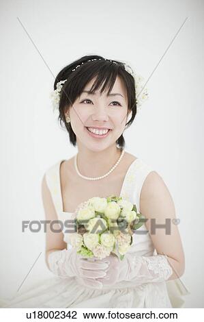 Stock Image - Portrait of Bride With Bouquet. Fotosearch