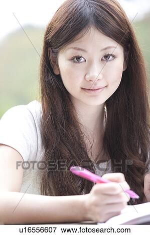 Stock Photo - Portrait of college student. Fotosearch