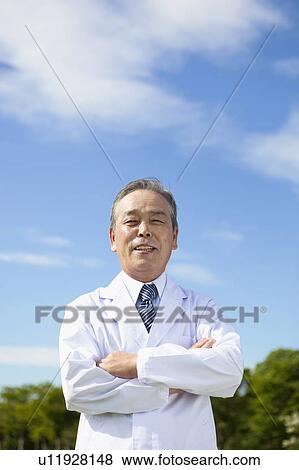 Portrait of Doctor Outdoors View Large Photo Image Stock Photo - Portrait of Doctor Outdoors. Fotosearch