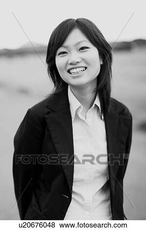 Stock Photo - Portrait of young woman . Fotosearch