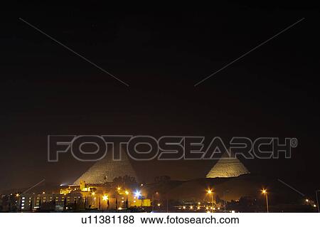 Stock Photo - Pyramids illuminated at night, Giza, Egypt. Fotosearch