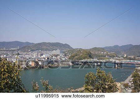 Stock Photography - River and Town at the Opposite Side. Fotosearch