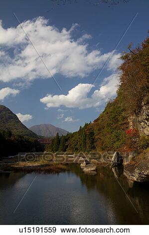 Stock Photo - River in Valley. Fotosearch