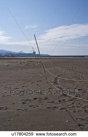 Rope Fence on Sandy Beach View Large Photo Image Stock Photo - Rope Fence on Sandy Beach. Fotosearch