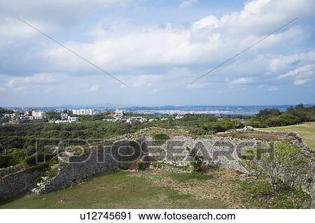 Stock Image - Ruin of Nakagusuku castle and townscape, Okinawa Prefecture, Japan. Fotosearch