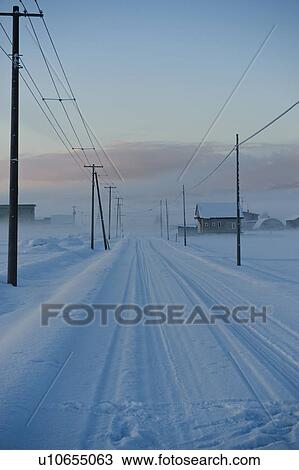 Stock Image - Rural Road in Winter Morning. Fotosearch